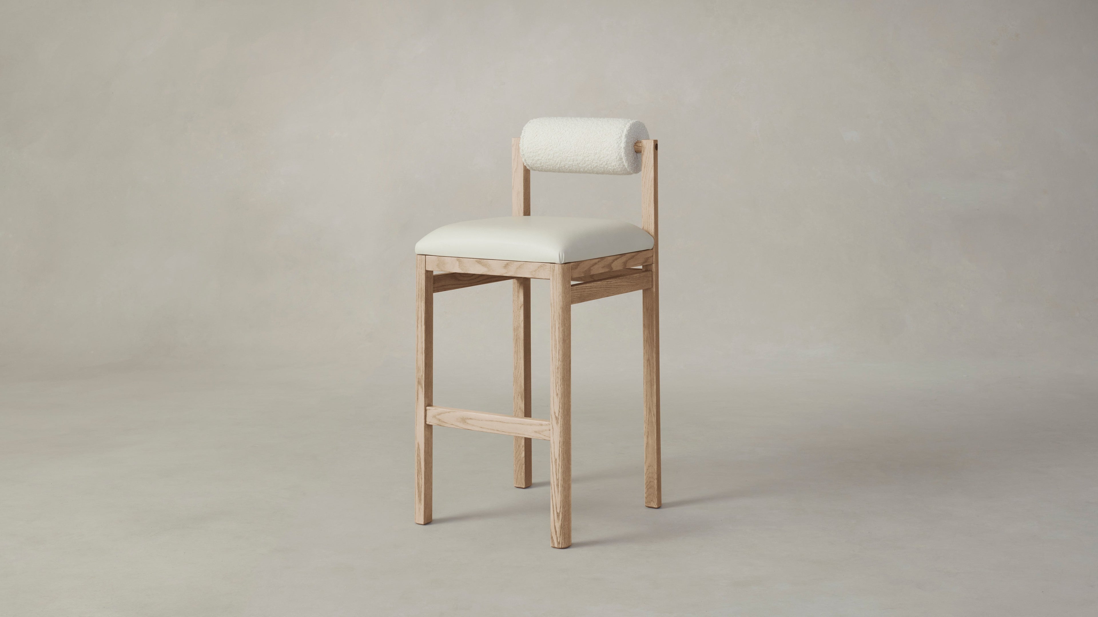 The Thayer  - Pebbled Leather Swan Seat Italian Bouclé White Bolster Bar and Counter Stool